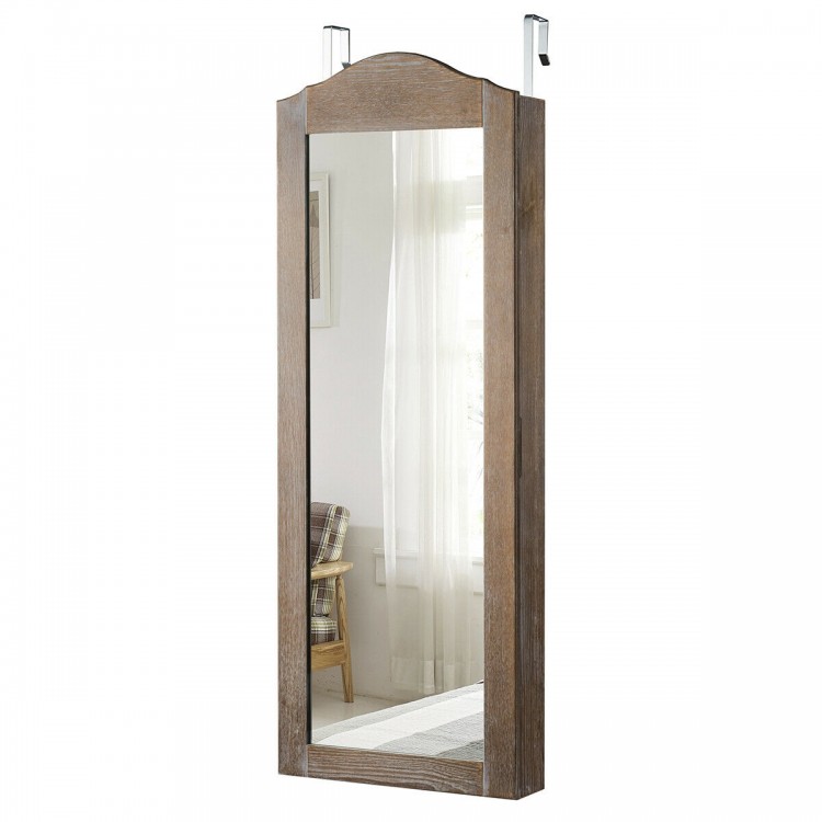 Wall-mounted jewelry armoire cabinet with full-length mirror, featuring storage for rings, necklaces, and earrings.