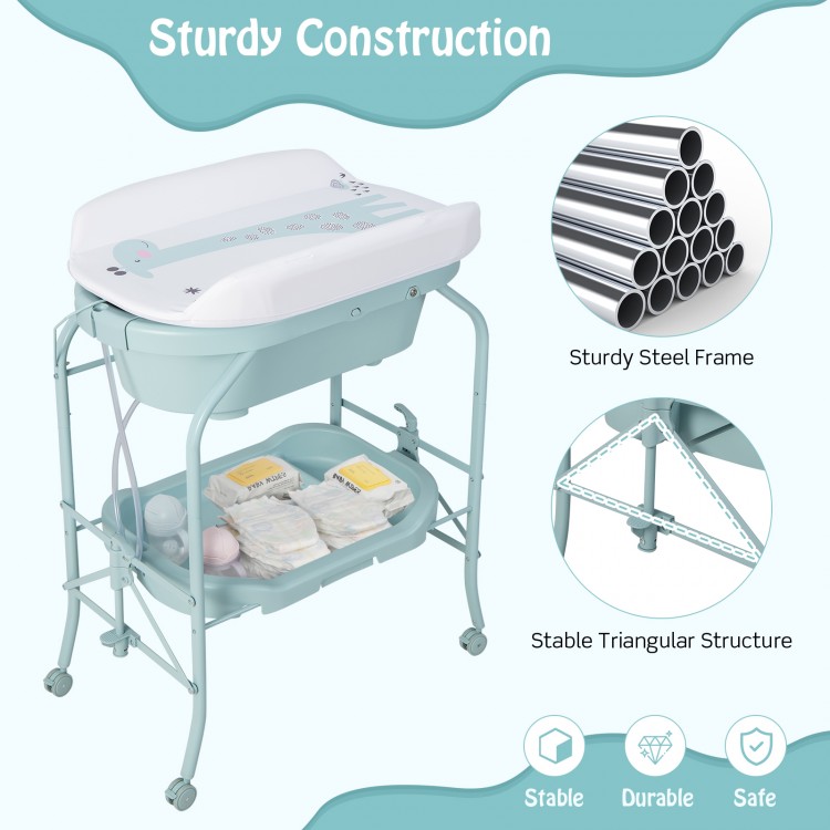 Folding baby changing table with bathtub, sturdy steel frame, waterproof pad, and 4 wheels for easy mobility and.