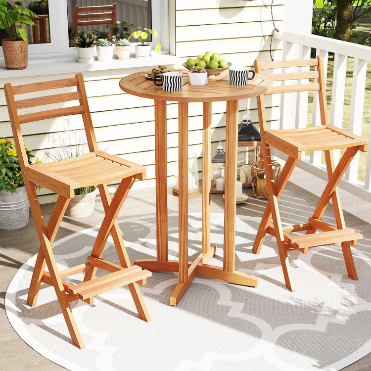 Acacia wood bar height chair with backrest and footrest, featuring a slatted design for outdoor comfort and portability.