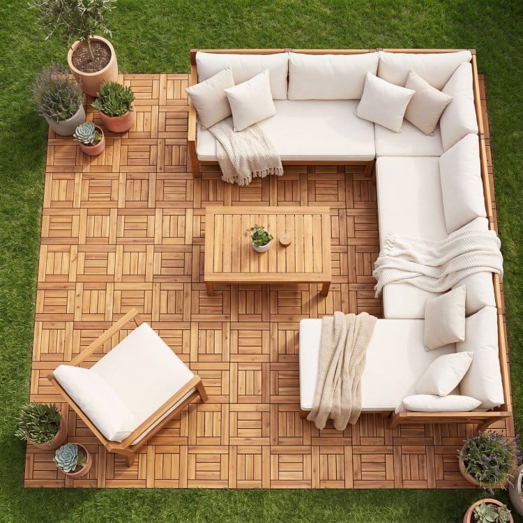 Acacia wood interlocking deck tiles arranged on a patio, showcasing natural beauty and easy setup for outdoor use.