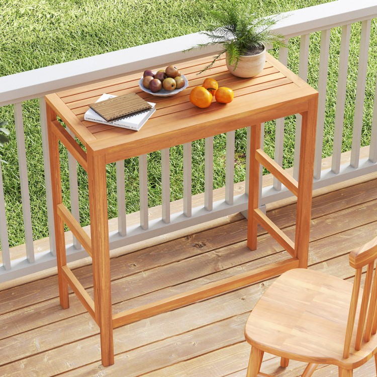 Acacia wood outdoor bar table with slatted tabletop, perfect for balcony use and space-saving storage.