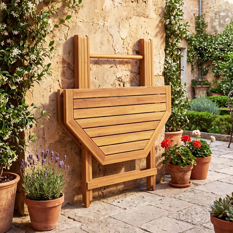 Folding octagonal acacia wood dining table for 4 with slatted tabletop, ideal for outdoor patios and gatherings.