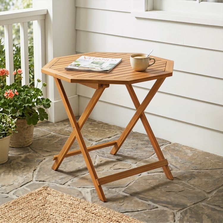 Octagonal acacia wood outdoor folding dining table for 4, featuring a slatted tabletop, ideal for patios and gardens.
