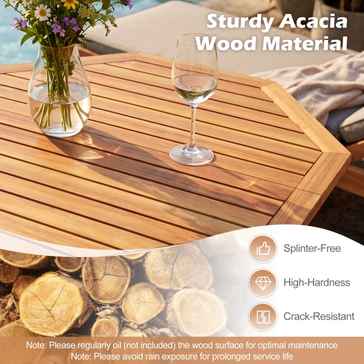 Octagonal acacia wood outdoor folding dining table for 4, featuring a slatted tabletop and sturdy X-shaped frame.