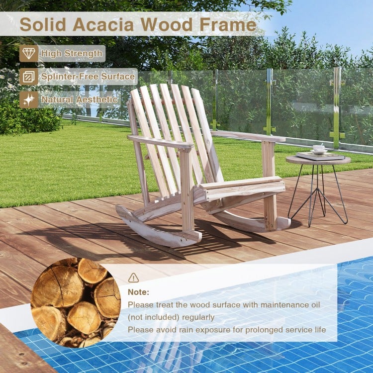 Adirondack rocking chair in natural acacia wood, featuring a slatted seat and high fanned back, perfect for outdoor.