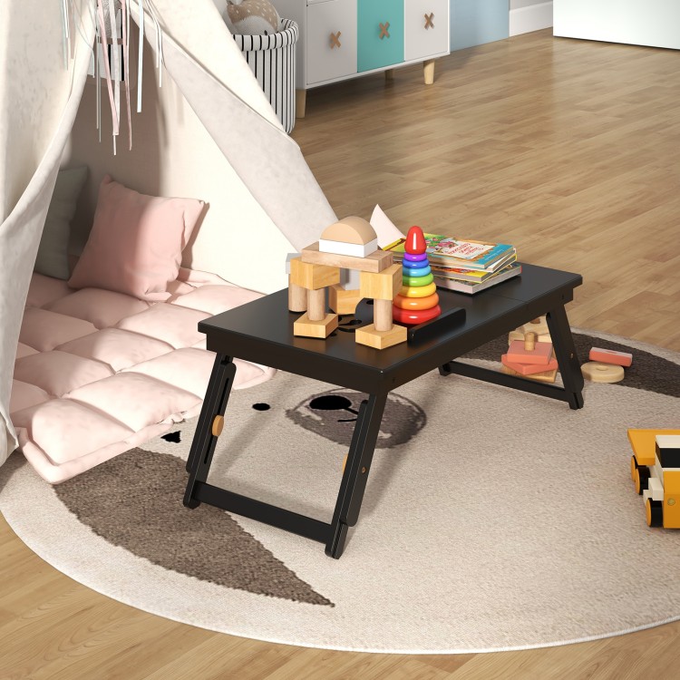 Adjustable bamboo laptop desk with tilting top and drawer, perfect for study or living room use.