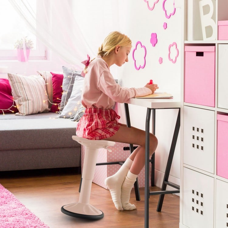 Adjustable-height pink wobble chair for kids, promoting active learning and good posture at a stand-up desk.