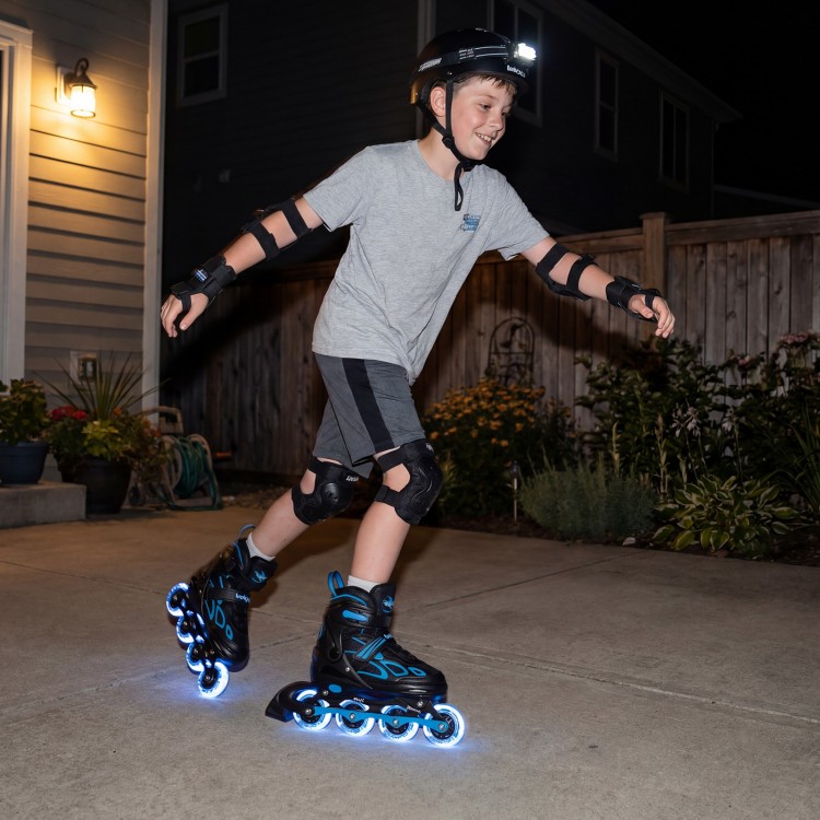 Adjustable kids' incline skates in blue with illuminating wheels, perfect for safe skating in low-light conditions.