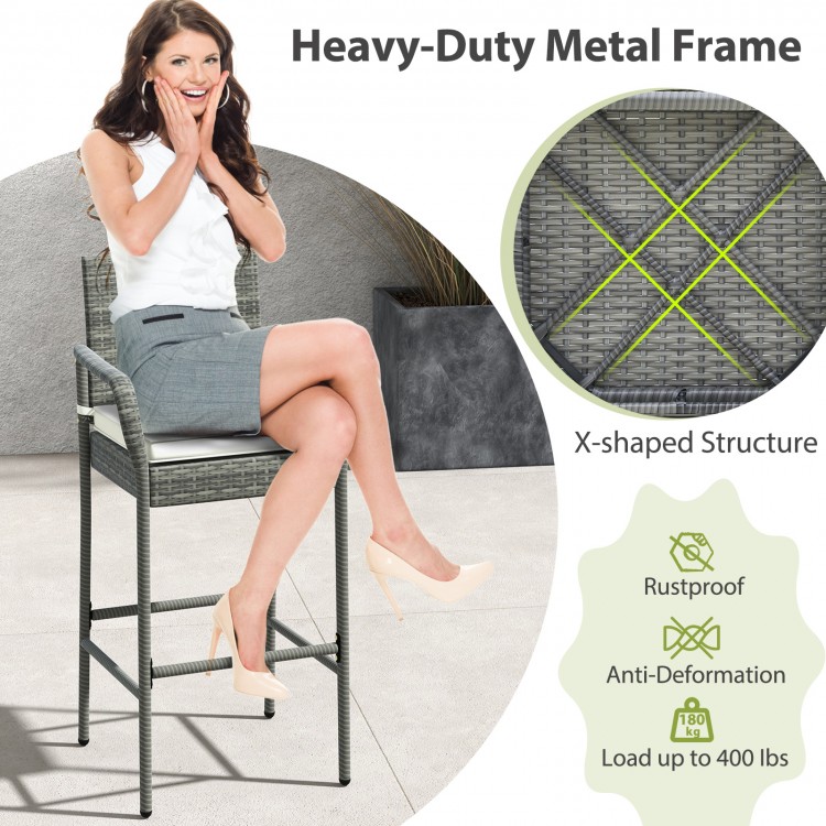 All-weather PE rattan bar chair with armrests, seat cushion, and heavy-duty metal frame for backyard relaxation.