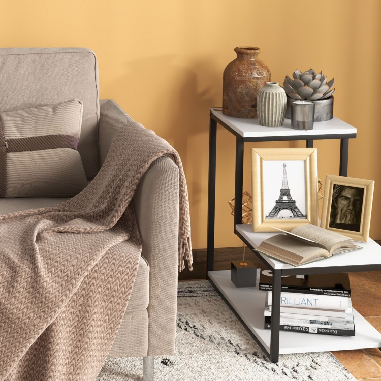 3-tier white side table with black steel frame, perfect for displaying books and decor in a living room or bedroom.