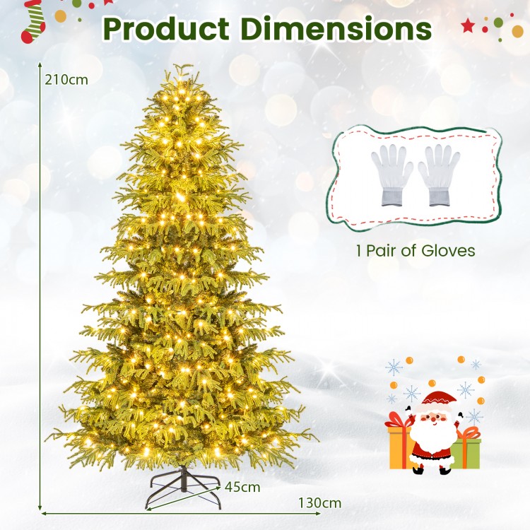 Artificial Christmas tree with LED lights, 210cm tall, featuring dense branch tips and a folding metal stand for easy.