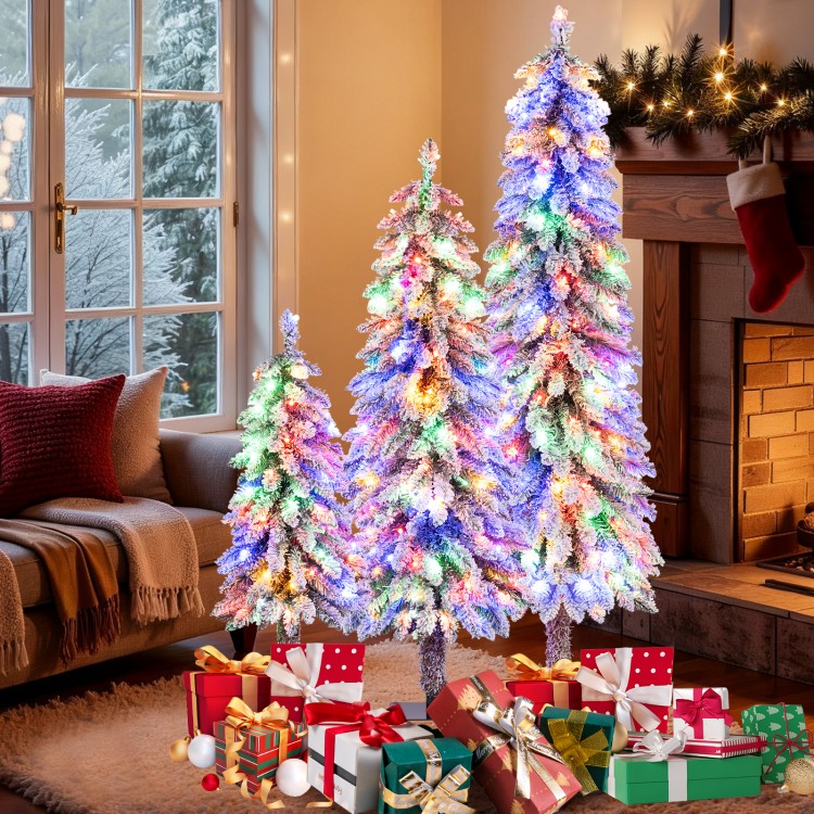 Three artificial Christmas trees with snow-flocked branches and multi-color LED lights, perfect for festive indoor.