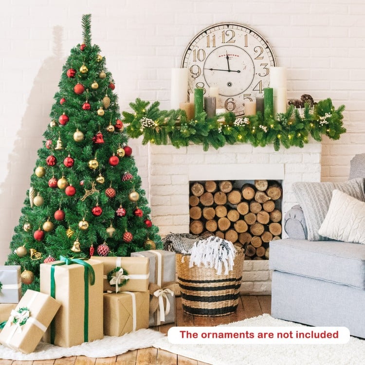 6 ft artificial PVC hinged Christmas tree with solid metal stand, perfect for indoor or outdoor holiday decoration.