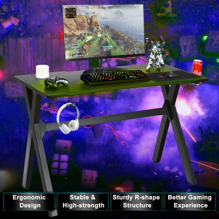 Ergonomic gaming desk with a spacious PVC carbon fiber surface, cup holder, and headphone hook for organized gaming.