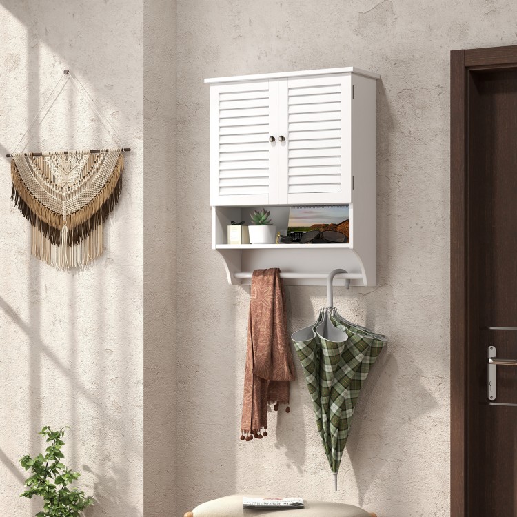 White wall-mounted medicine cabinet with louvered doors, adjustable shelves, and bottom towel bar for organized.