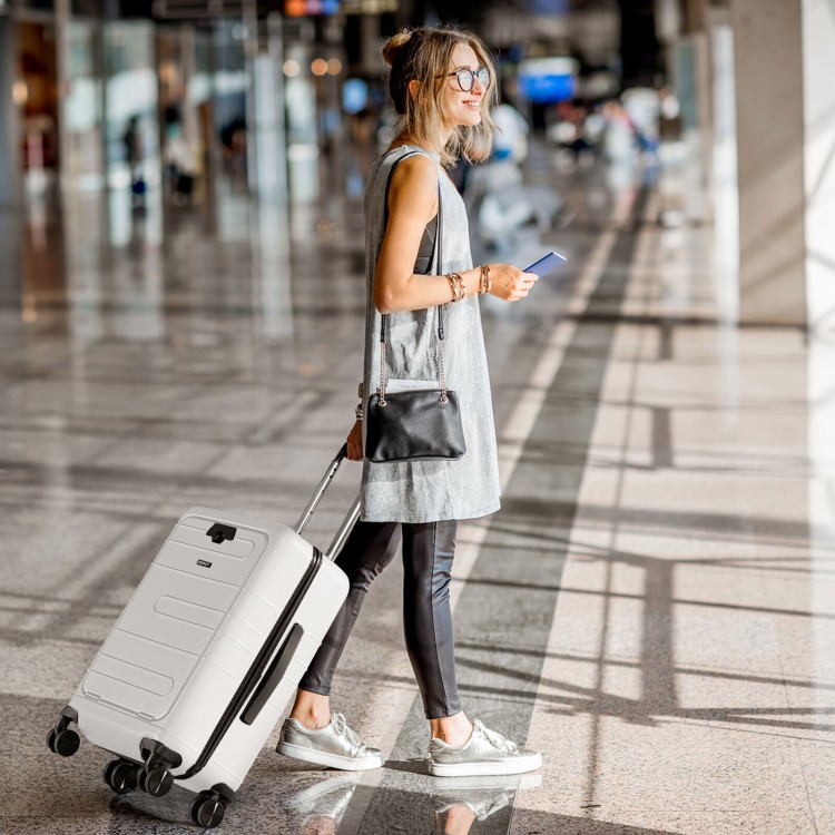 20-inch white hardside carry-on luggage with front pocket and USB port, perfect for short trips and business travel.