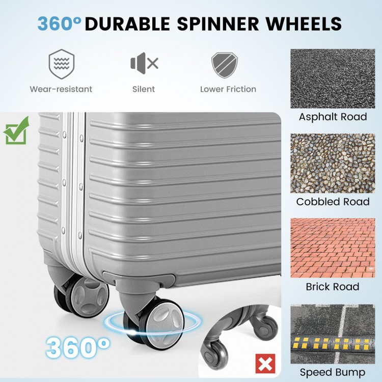 Durable 360° spinner wheels on 16-inch silver carry-on luggage for easy movement and travel convenience.