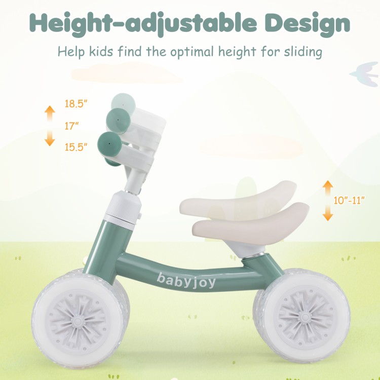 Close-up view of the green baby balance bike's height-adjustable seat and handlebars, promoting comfort and safety for.