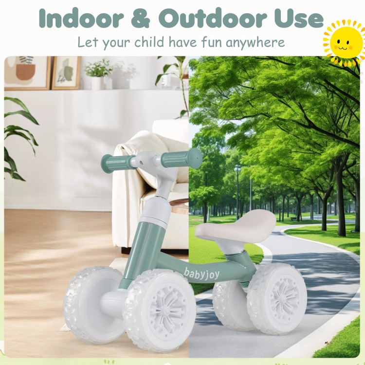 Green baby balance bike showing the 45° steering limit for safe riding, designed for indoor and outdoor use for.