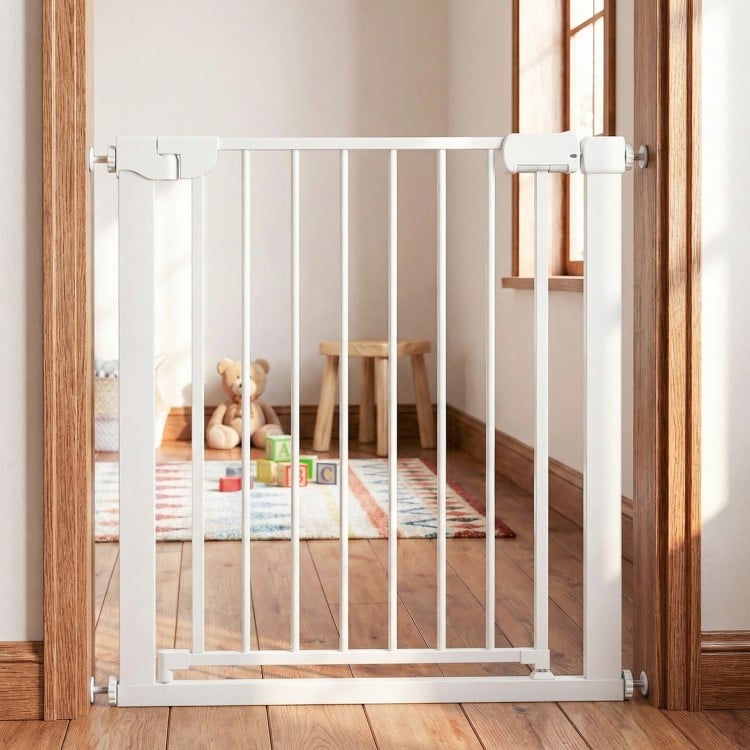 White baby gate for stairs with pressure mount, featuring one-handed operation and double-lock safety, shown in a home.