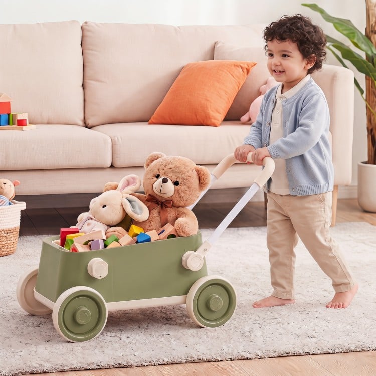Baby push walker in green with a foldable handlebar and large storage basket, ideal for toddlers aged 3 to 6 years.