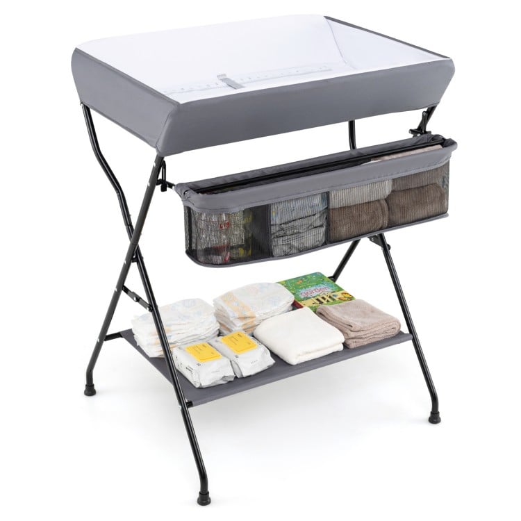 Gray baby storage folding diaper changing table with three compartments for easy access, perfect for convenient diaper.