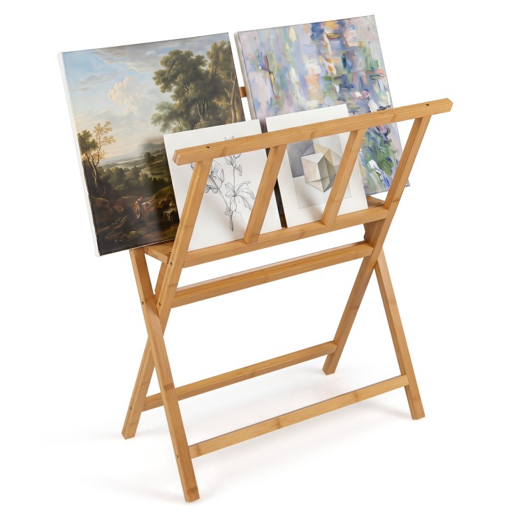 Bamboo art print rack with open storage design, holding canvases up to 34" x 19", ideal for art studios and exhibitions.