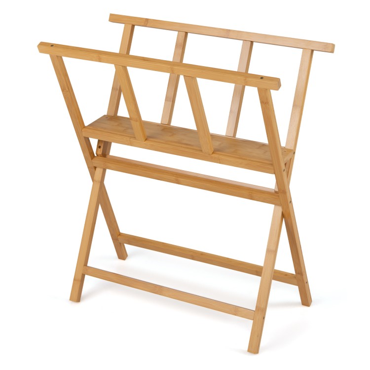 Bamboo art print rack features an open design with a middle shelf, ideal for displaying canvases and artwork up to 34" x 19".