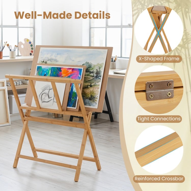 Bamboo art print rack features an X-shaped frame and middle shelf for displaying canvases and artwork up to 34" x 19".