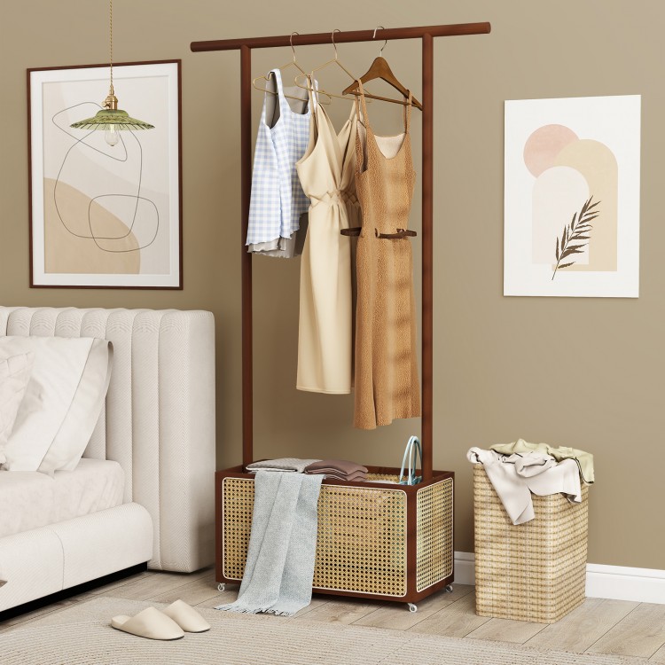 Bamboo clothes rack with rattan storage basket on wheels, featuring hanging space and rustic design for versatile use.