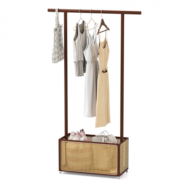 Bamboo clothes rack with hanging rod and rattan storage basket, featuring wheels for easy movement and rustic style.