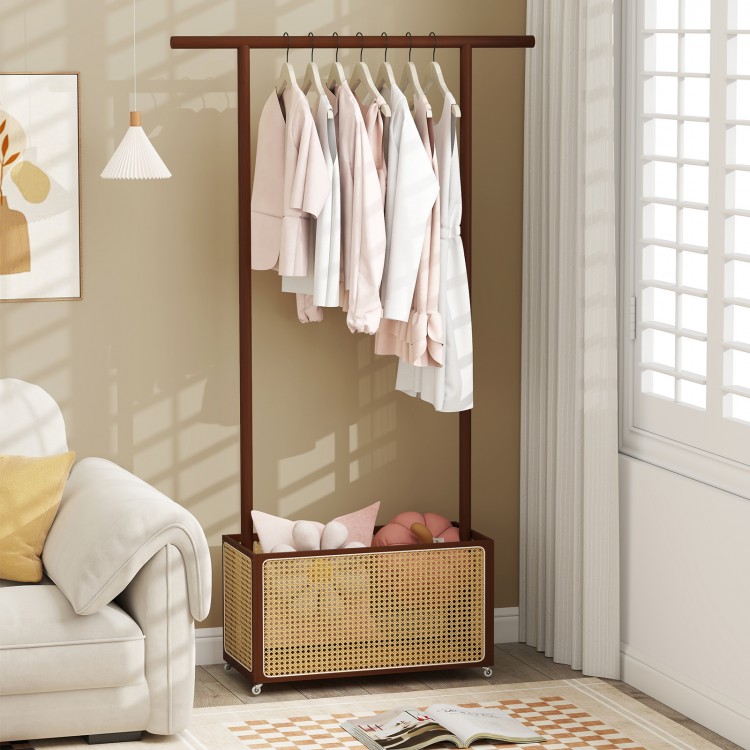 Bamboo clothes rack with rattan storage basket on wheels, ideal for organizing entryways or bedrooms.