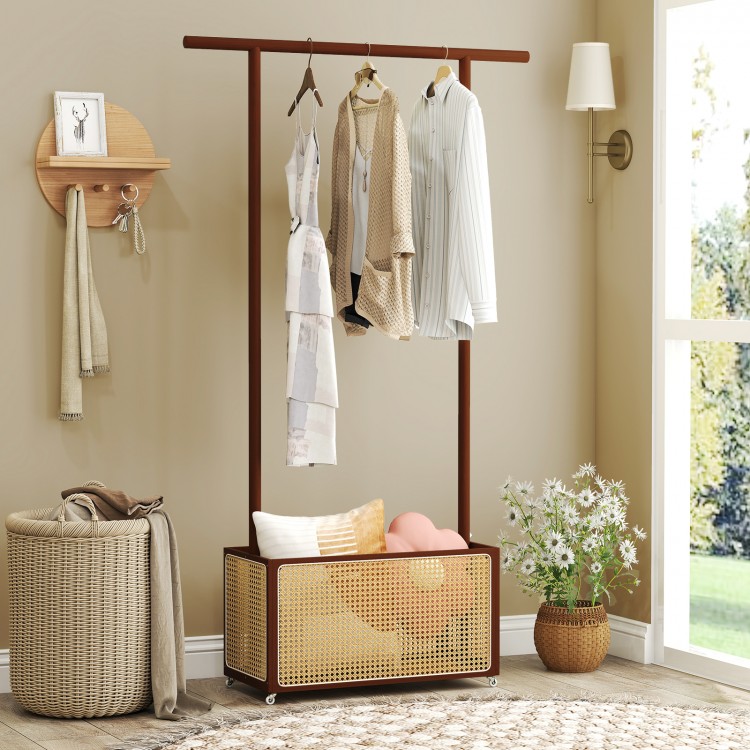 Bamboo clothes rack with a rattan storage basket on wheels, ideal for entryway or bedroom organization.