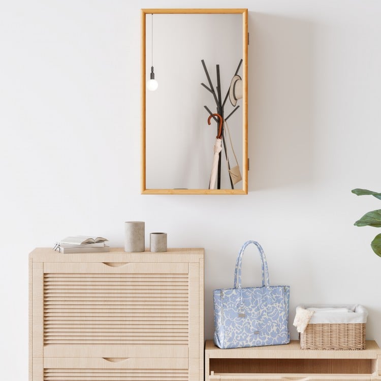 Bamboo small medicine cabinet showcasing a high-definition acrylic mirror and natural wood finish, perfect for stylish.