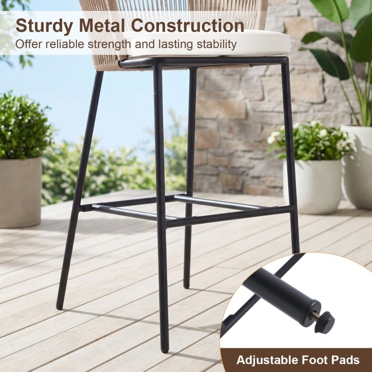 Bar height woven rope patio chair with sturdy metal construction and adjustable foot pads, ideal for outdoor relaxation.