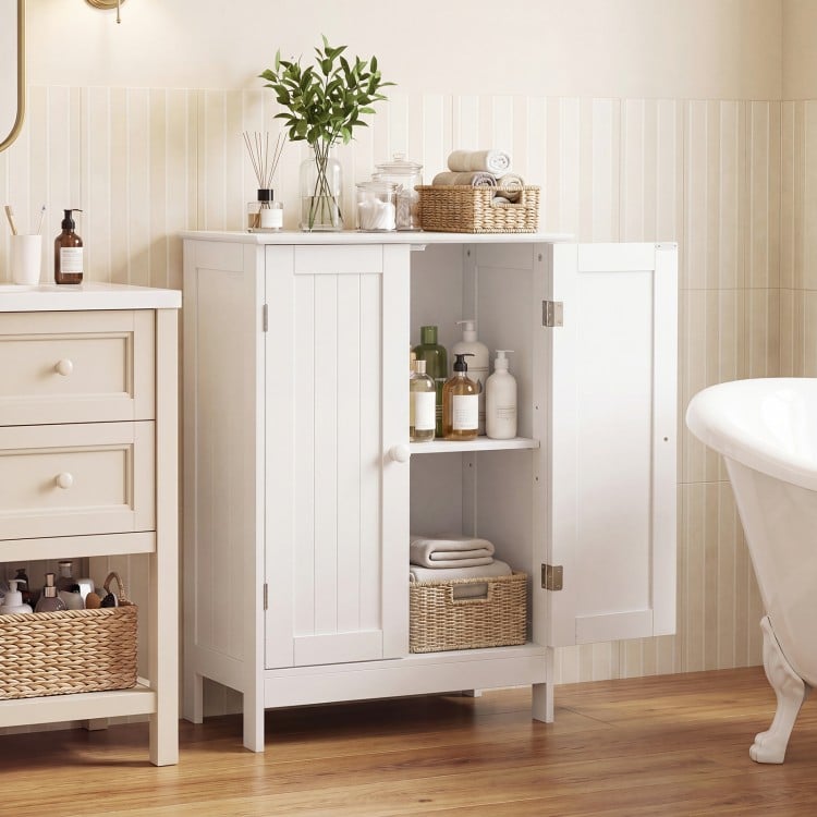 Elegant white bathroom cabinet with double doors and two interior shelves, perfect for storing cosmetics and toiletries.