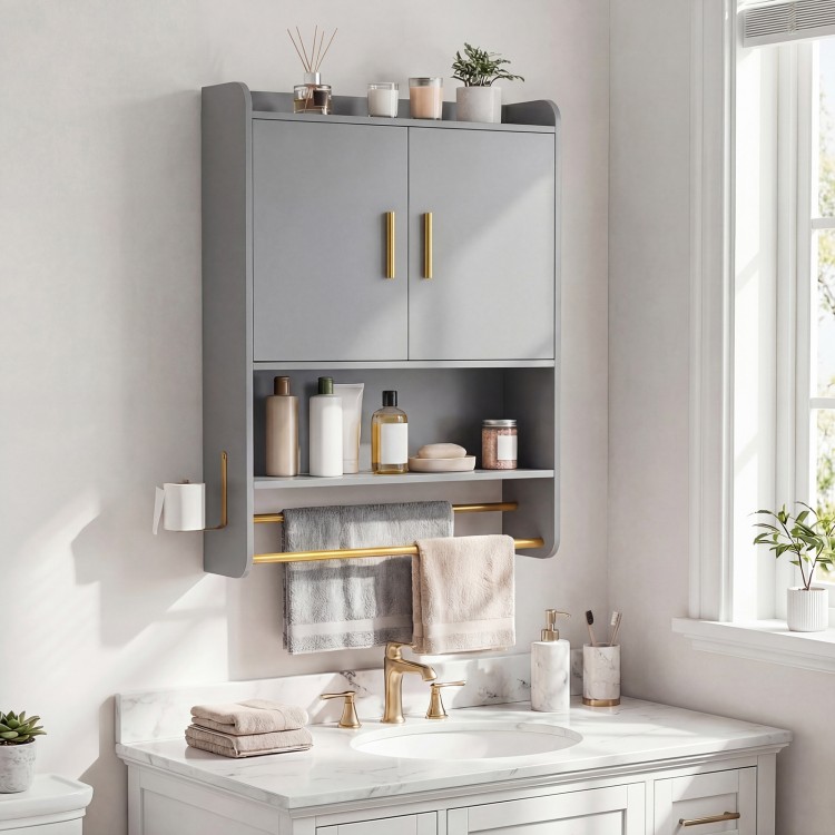 Wall-mounted grey bathroom cabinet with gold handles, featuring closed storage, open shelves, and towel bars for.