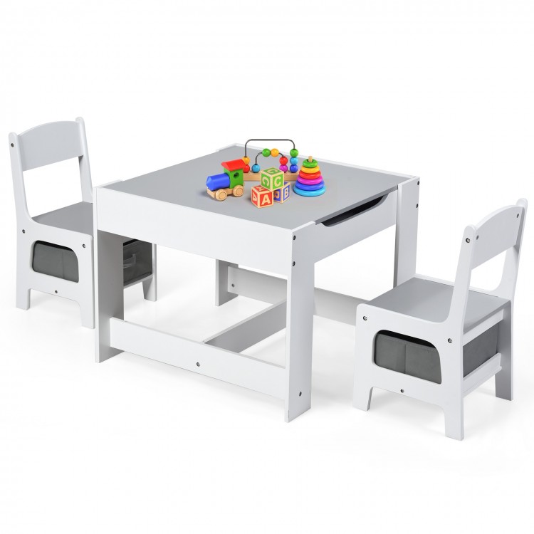 White kids table with two chairs, featuring storage boxes and a 2-in-1 drawing surface for creative activities and play.