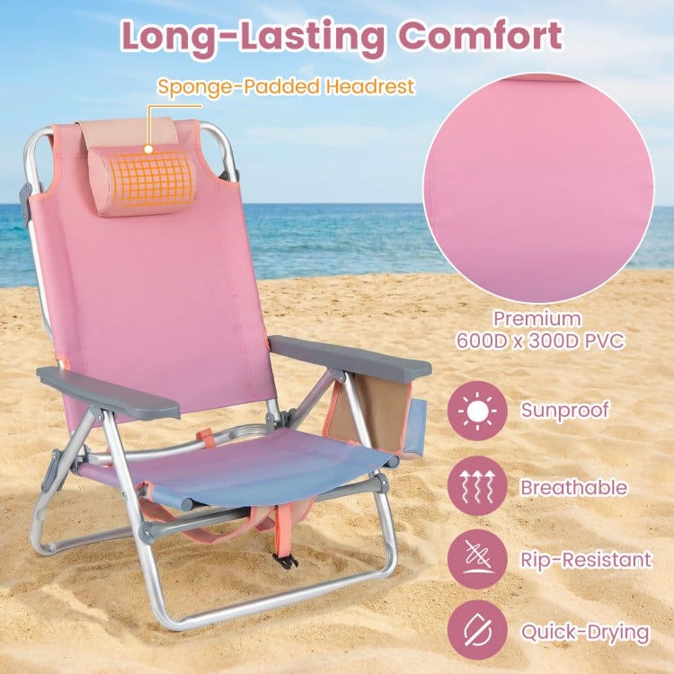 Portable folding beach chair in gradient pink with padded headrest, 5-position backrest, and cup holder for outdoor.