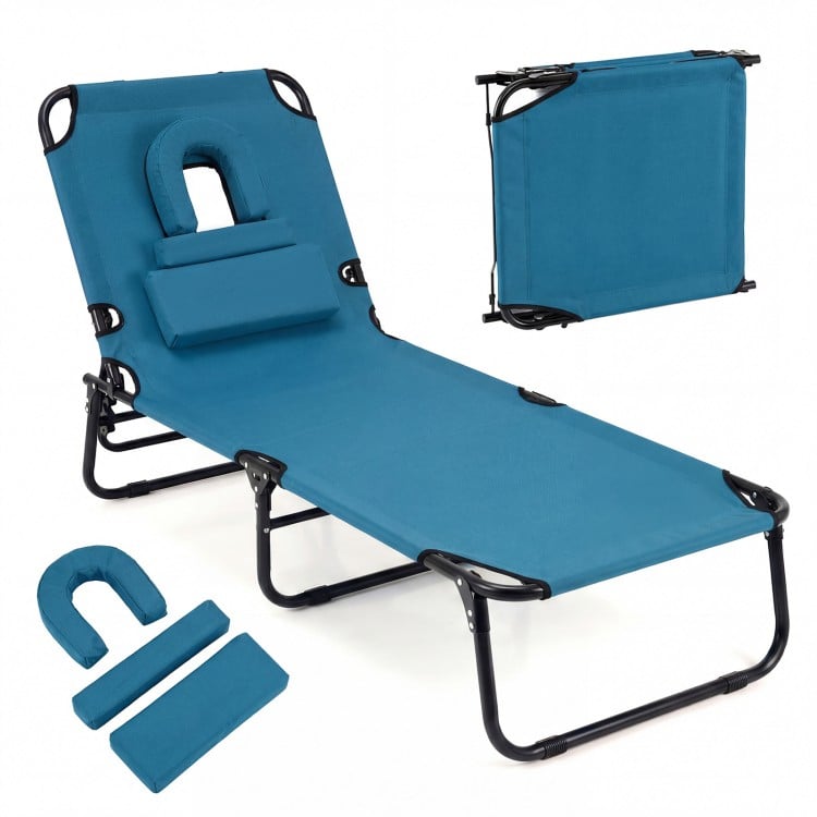 Beach chaise lounge chair in blue with adjustable backrest, face hole, and removable pillows for versatile outdoor use.