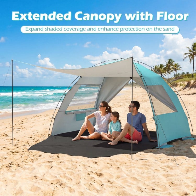 Beach tent sun shelter in blue with extended canopy and floor, providing UPF50+ protection for family comfort on the.