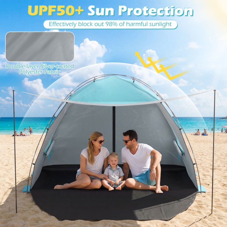 Beach tent sun shelter in blue with UPF50+ protection, spacious interior for 3-4 people, and extended floor for added.