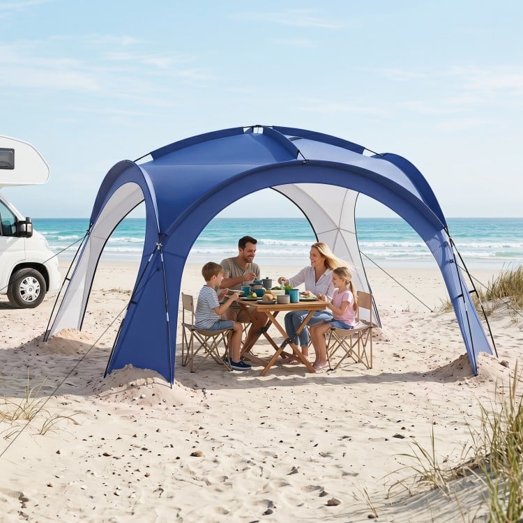 Large blue beach tent for 12-15 people with removable sidewalls, providing sun protection and customizable privacy.