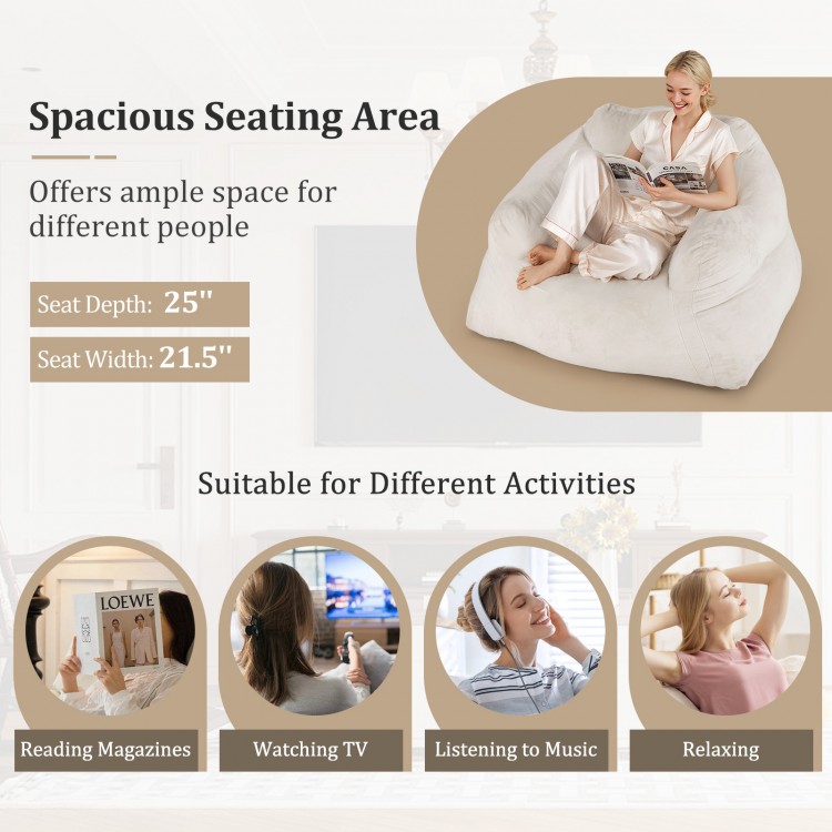 Bean bag chair in beige with plush velvet cover, offering spacious seating for relaxing, reading, or watching TV.