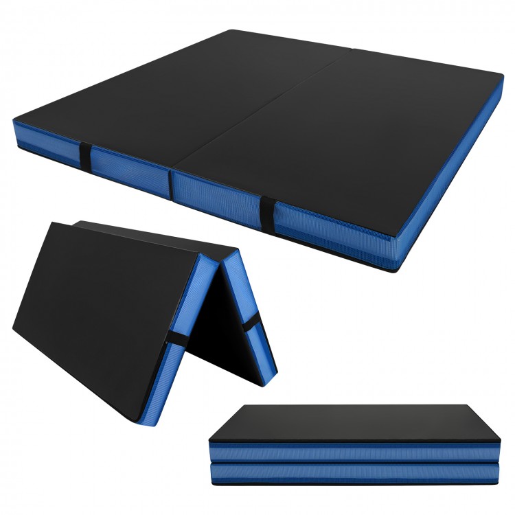 Thick black bi-fold gymnastics mat with blue edges, featuring carrying handles for easy transport and storage.