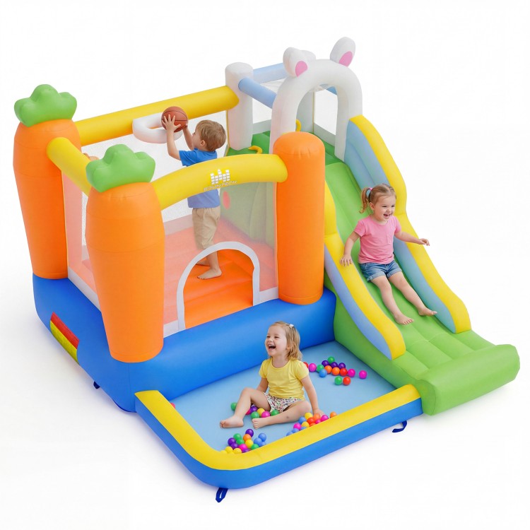 Colorful bounce house with climbing wall, slide, and ball pit for kids aged 3-12, perfect for backyard parties.