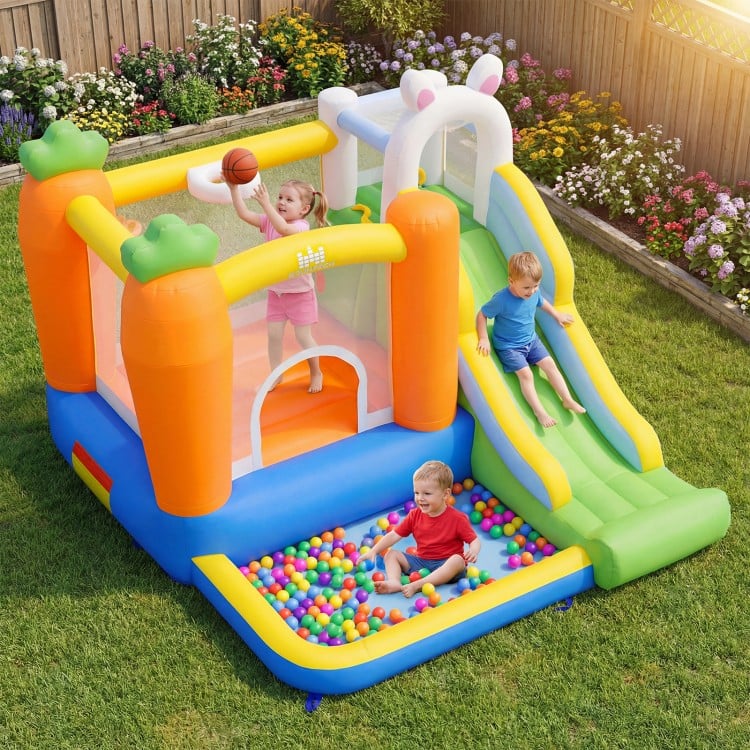 Colorful ball pit area of the bounce house for kids aged 3-12, designed for fun and safety during backyard parties.