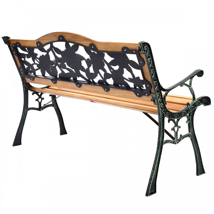 Side view of outdoor bench featuring a rose pattern backrest, crafted from cast iron and solid wood, ideal for patio.