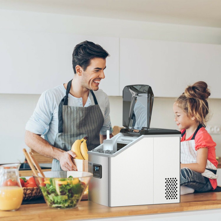 Stainless steel ice maker with LCD display, producing 48 lbs of ice daily, perfect for home kitchens and parties.