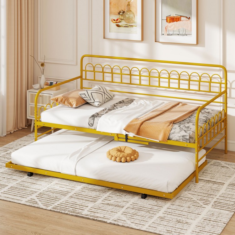 Twin daybed with curved backrest in gold, featuring a pull-out trundle for extra sleeping space in a stylish design.